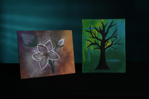 Painting of a flower and another painting of a tree