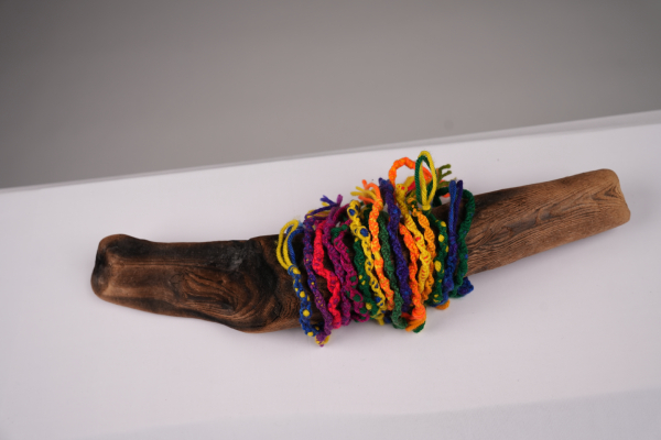 bracelets on log