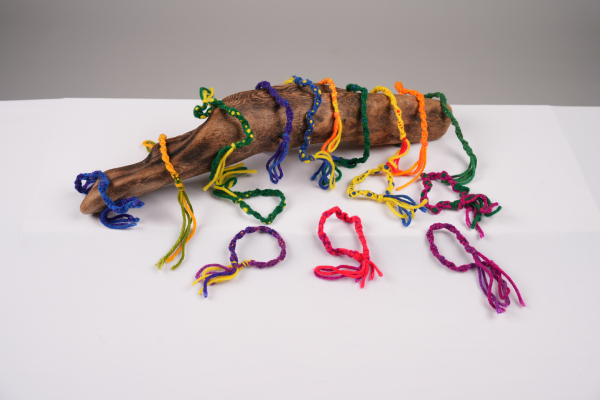 bracelets on log and table